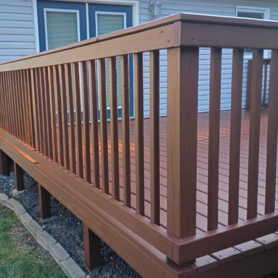 Freshly stained and refinished wood deck with railings - deck repair Central Illinois