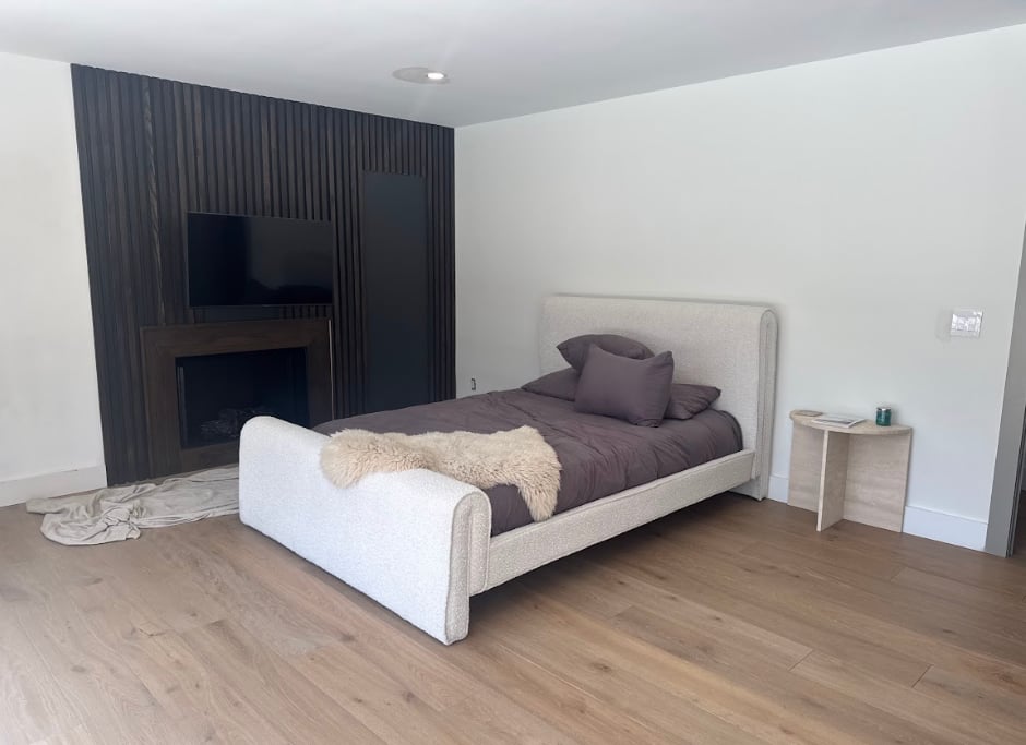 Freshly painted bedroom interior with clean white walls - interior painting services Central Illinois