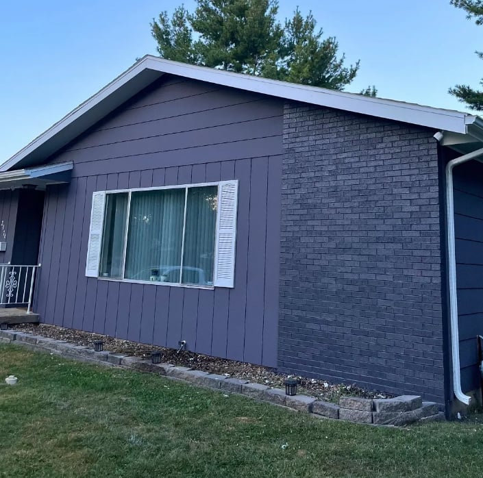 professional exterior painting contractor in Decatur Illinois - freshly painted home with charcoal siding and brick