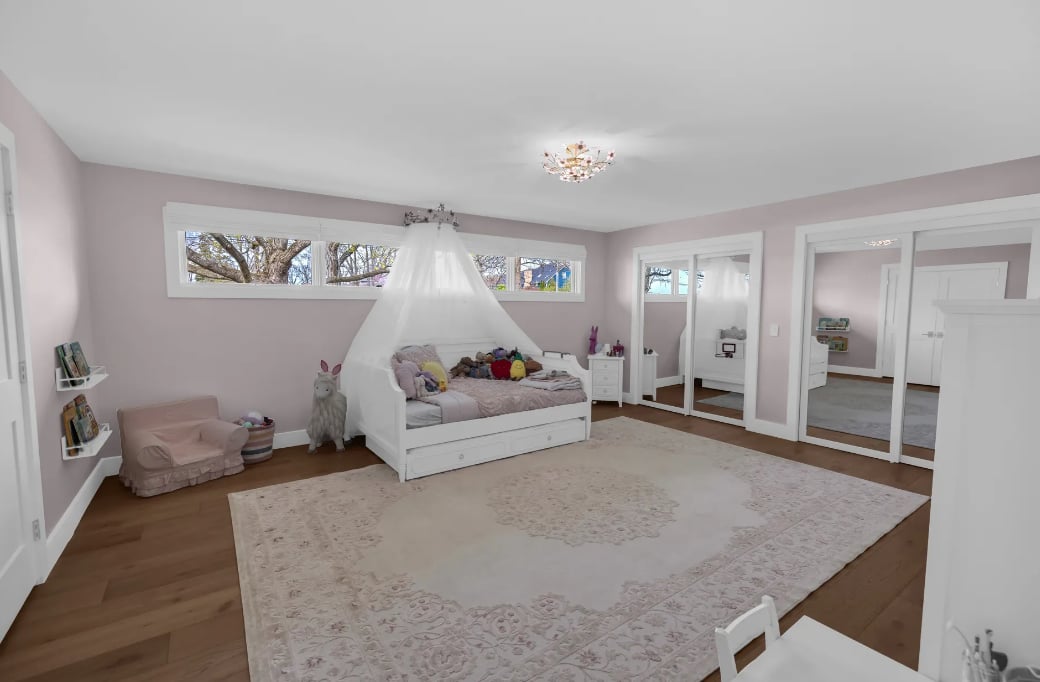 Beautifully painted girl's bedroom with soft pink walls and white trim by Clean Cut Painting & Handyman in Springfield Illinois