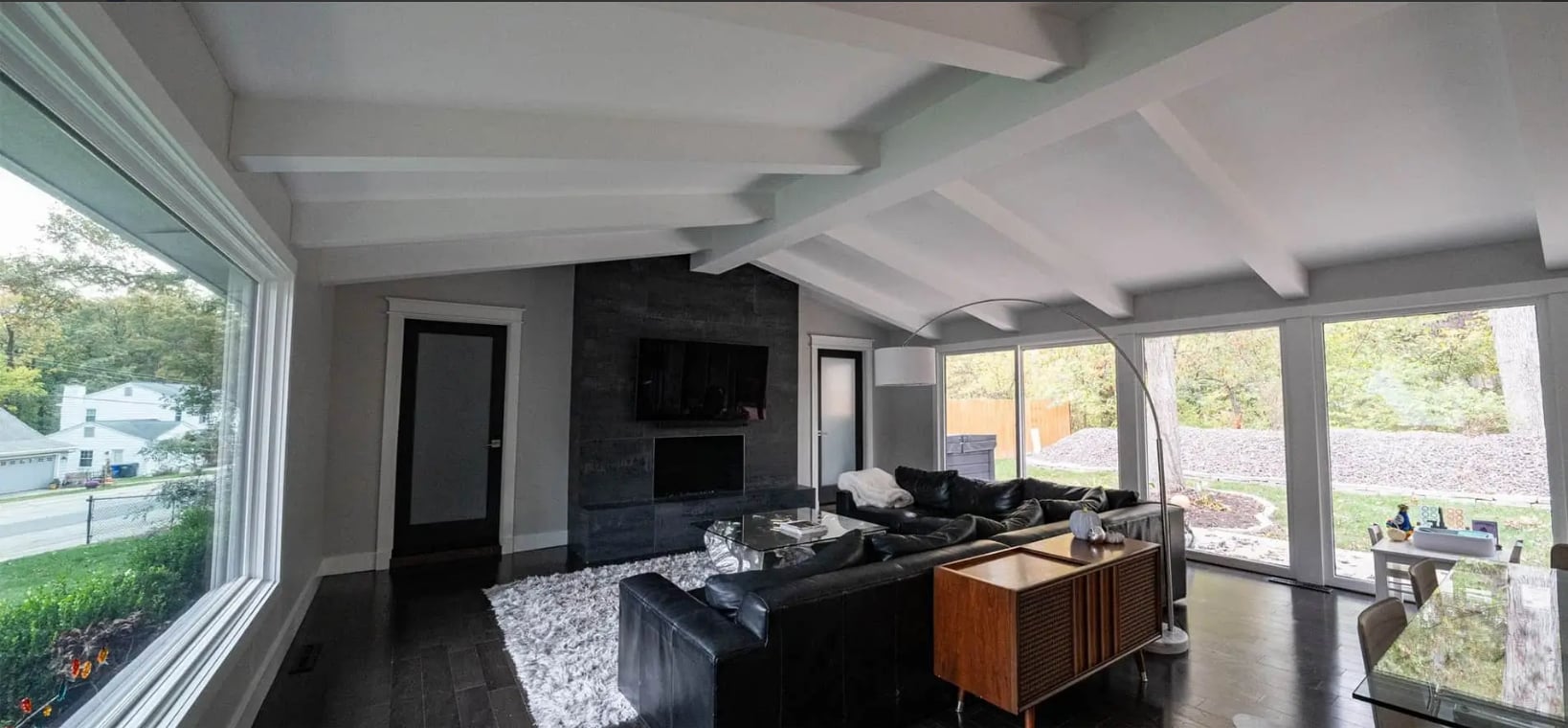 Interior painting Springfield Illinois — Clean Cut Painting modern living room with painted white beamed ceiling and trim